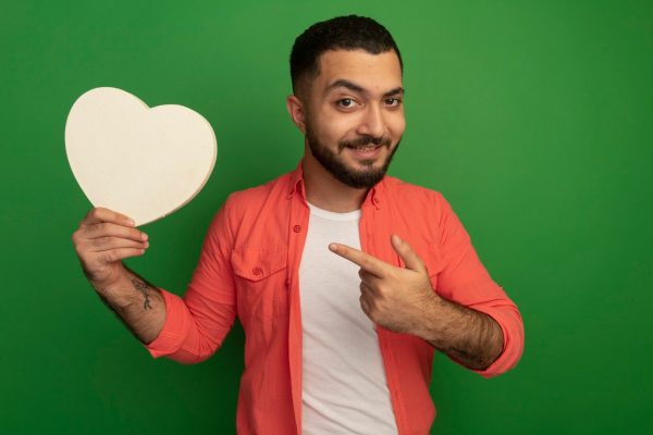 signs he likes you but is hiding it